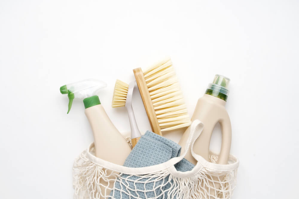 Eco Brushes and Rag on White Background