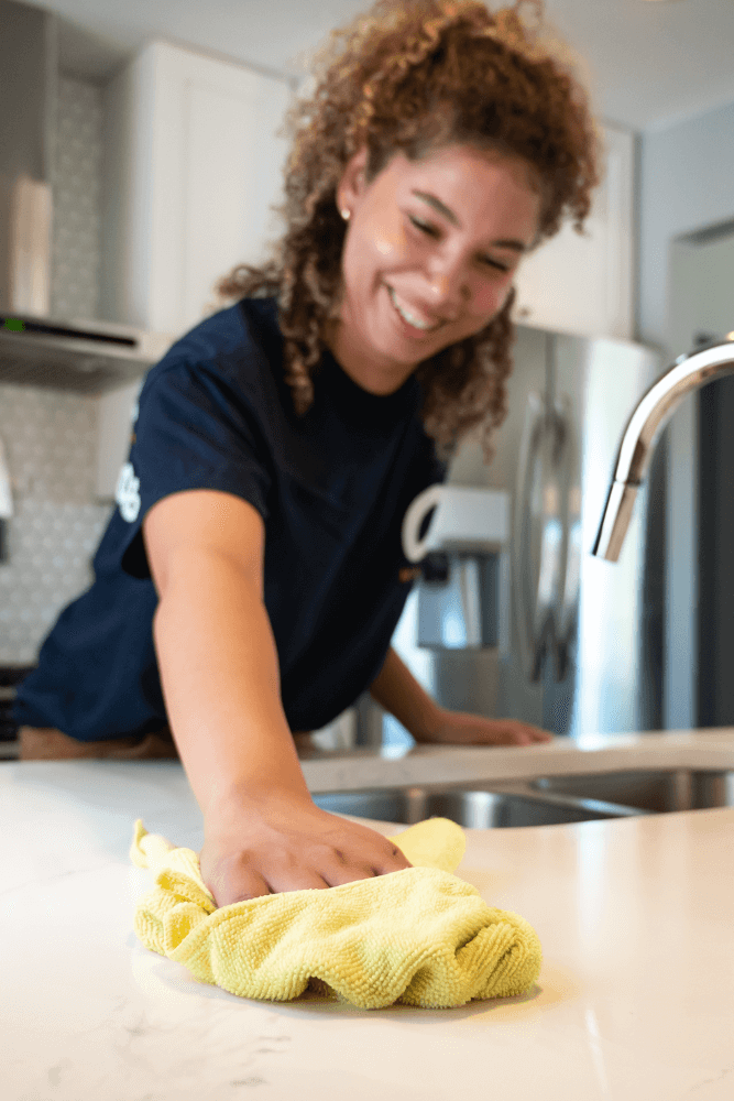 Caring Maid Cleaning Counter